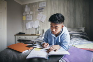 Student concentrating on homework
