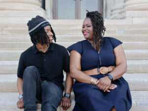 Staycee sitting with her son.