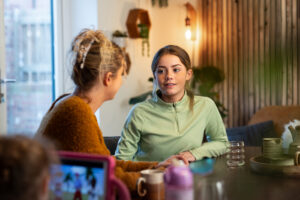 Mother and daughter talking.