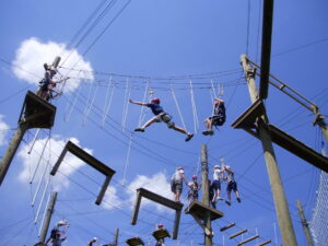 Youth on the ropes course at Meramec Adventure Ranch