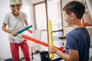 Youth with autism participating in creative therapy in St. Louis.