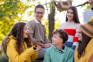 Teens spending quality time together outside.