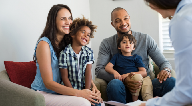 A family meets one-on-one with a Wraparound Facilitator to discuss their child’s needs and create a support plan.