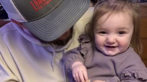 Brayton Erickson spending time with his child